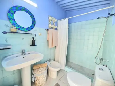 Un baño de Small cozy house Susana
