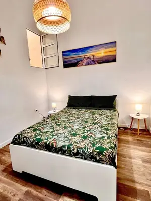Cama o camas de una habitación en Cozy Refuge La Isleta
