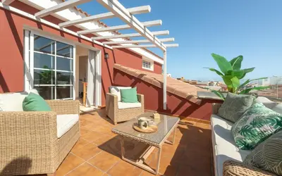 Un balcón o terraza de Chalé con terraza en la costa