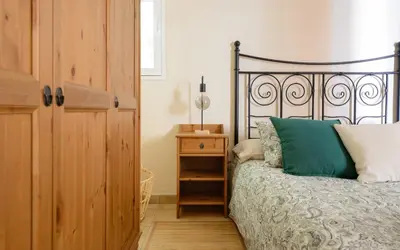 Cama o camas de una habitación en Chalé con terraza en la costa