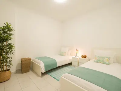 Cama o camas de una habitación en CITY FAMILY Néstor de la Torre