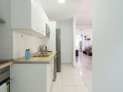 Una cocina o zona de cocina en CITY FAMILY Néstor de la Torre