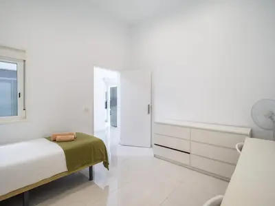 Cama o camas de una habitación en Confital Beach Home By CanariasGetaway