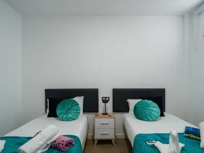 Cama o camas de una habitación en Suans House
