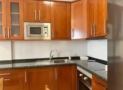 Una cocina o zona de cocina en Apartamento Bonito Las Canteras