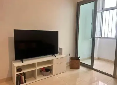 Una televisión o centro de entretenimiento en Apartamento Bonito Las Canteras