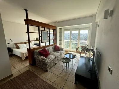 Cama o camas de una habitación en Apartamento-Estudio con vistas
