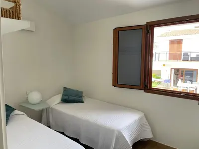 Cama o camas de una habitación en San Agustín BeachSun Relax