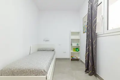 Cama o camas de una habitación en Garden House - La Isleta