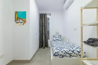 Cama o camas de una habitación en Garden House - La Isleta