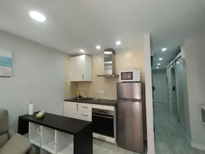 Una cocina o zona de cocina en Las arenas 50