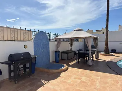 Un balcón o terraza de Large Villa in Maspalomas with Huge Private Pool, Jacuzzi & Gym
