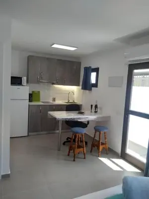 Una cocina o zona de cocina en Yumbo Rainbow Homes B