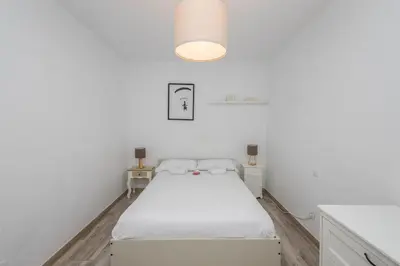 Cama o camas de una habitación en The Sweet Home - 3BR & 4 min Las Canteras