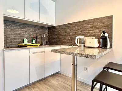 Una cocina o zona de cocina en Cosy Pool View Apartment Tinache