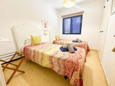 Cama o camas de una habitación en Surf House Meloneras