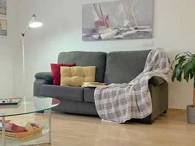Zona de estar de Suites Esencia Atlántica: Mar, montaña y relax