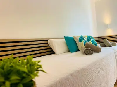 Cama o camas de una habitación en Las Brisas 51 by SunHousesCanarias