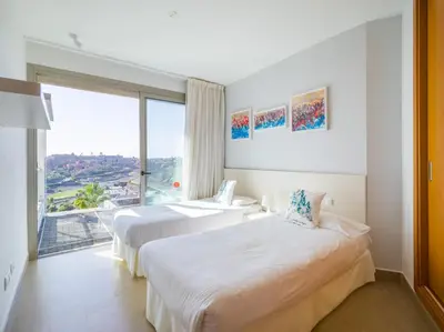 Cama o camas de una habitación en Salobre Golf Villas Golfers