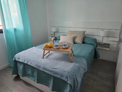 Cama o camas de una habitación en The Blue Calla