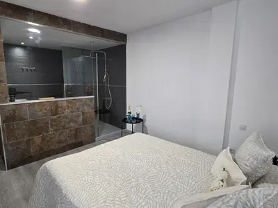 Cama o camas de una habitación en The Blue Tamadaba