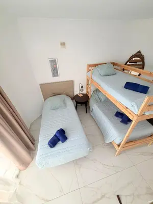 Cama o camas de una habitación en Casa Liliana