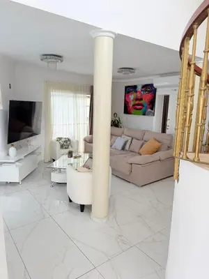 Una televisión o centro de entretenimiento en Casa Liliana