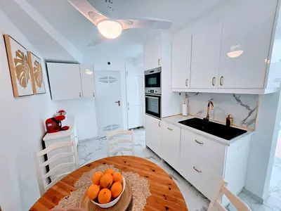 Una cocina o zona de cocina en Blue Sky Apartment