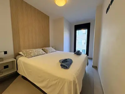 Cama o camas de una habitación en Las Canteras Deluxe