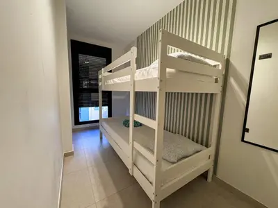 Cama o camas de una habitación en Las Canteras Deluxe