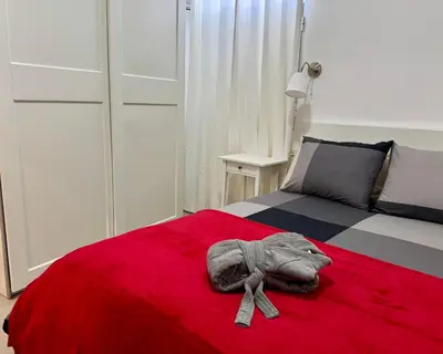 Cama o camas de una habitación en Apartamento Parque Romano