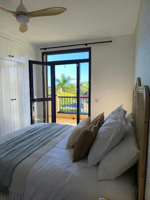 Cama o camas de una habitación en Meloneras Garden Bungalow