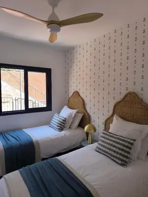 Cama o camas de una habitación en Meloneras Garden Bungalow