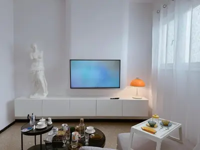 Una televisión o centro de entretenimiento en VV Vegueta Lovely Home 