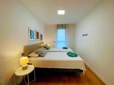 Cama o camas de una habitación en Las Canteras Deluxe