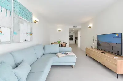Una televisión o centro de entretenimiento en Balcon Azul IV by VillaGranCanaria
