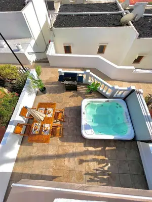 Un balcón o terraza de Paradise Dúplex Calm & Jacuzzi Puerto Rico