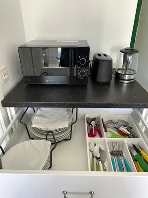 Una cocina o zona de cocina en Cozy Apartament Maspalomas