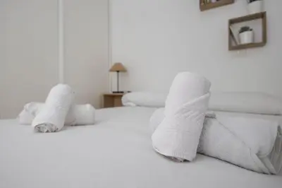 Cama o camas de una habitación en Cozy Mesa Y López House 5min To Las Canteras
