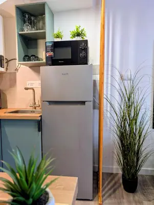 Una cocina o zona de cocina en Cosy Bungalow with Terrace & Jacuzzi