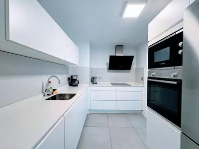 Una cocina o zona de cocina en Las Canteras Deluxe