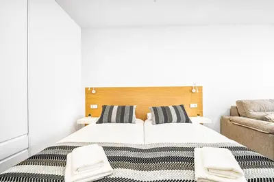 Cama o camas de una habitación en La Marquesa Ten Suites Canteras