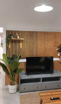 Una televisión o centro de entretenimiento en Apartamento Puertillo