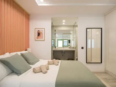 Cama o camas de una habitación en Estudio en barrio historico Las Palmas GB1D