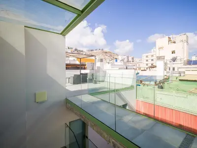 Un balcón o terraza de Apartamento moderno en centro historico GB2A