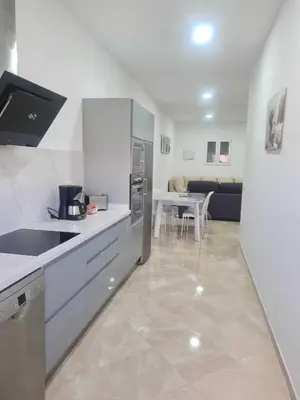 Una cocina o zona de cocina en Apartamento Cerca de Maspalomas