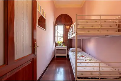 Cama o camas de una habitación en Triana modernista