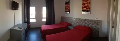 Una televisión o centro de entretenimiento en Hotel Playa de Arinaga