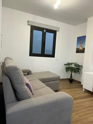 Zona de estar de El Faro Suite Arinaga