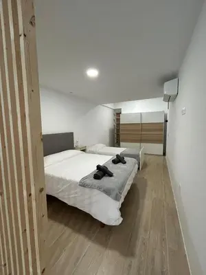 Cama o camas de una habitación en Las Tabaibas beach house